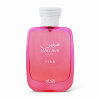 A pink bottle of Ameni Hawas Pink perfume with a white cap and label in Arabic script.