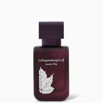 A purple bottle of La Yuqawam Jasmine Wisp perfume with a leaf design and white text.