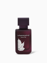 A purple bottle of La Yuqawam Jasmine Wisp perfume with a leaf design and white text.