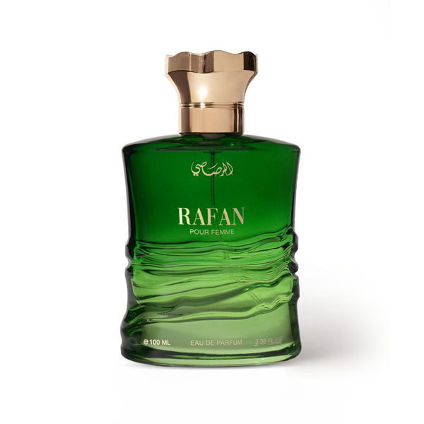 Green perfume bottle with gold cap on a white background